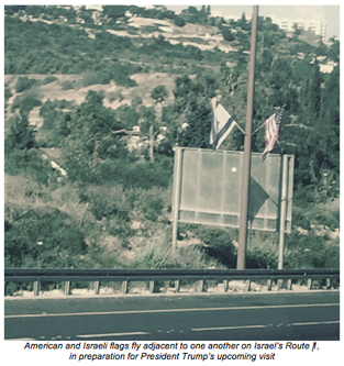 israeli and american flags on route 1
